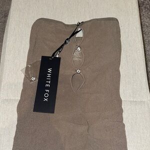 white fox strapless dress. ONE SIZE FITS MOST!!! looks tiny, has stretch.